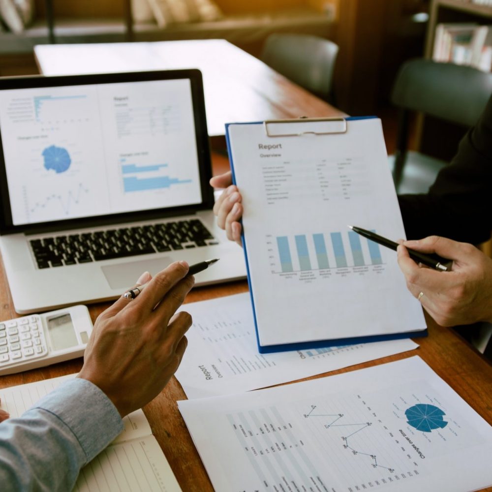two-business-partnership-coworkers-analysis-strategy-with-discussing-a-financial-planning-graph-and-e1638181148665-pgru0uh76lotlkdufb71qzsuposlsbw99mbmhji87k